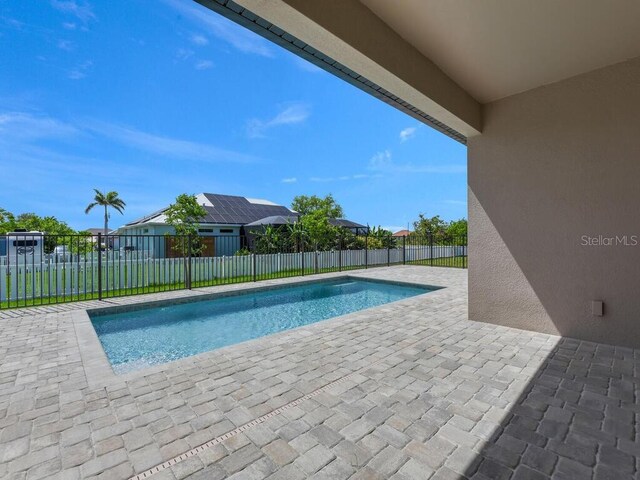 9257 King Hill St, Port Charlotte, FL 33981 - view of pool featuring a patio and a fenced backyard