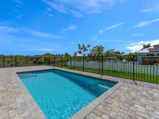 9257 King Hill St, Port Charlotte, FL 33981 - view of pool with a fenced backyard and a patio area