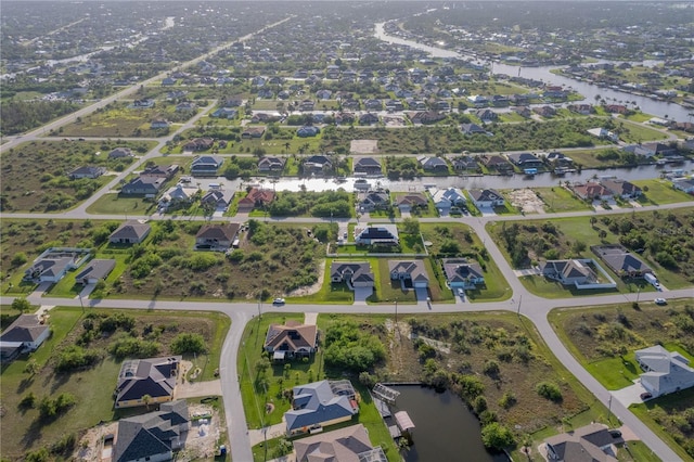 9257 King Hill St, Port Charlotte, FL 33981 - aerial overview of property's location featuring nearby suburban area and a large body of water