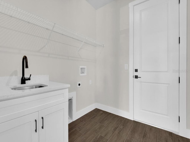 9257 King Hill St, Port Charlotte, FL 33981 - laundry room featuring hookup for a washing machine, electric dryer hookup, and dark wood-style flooring