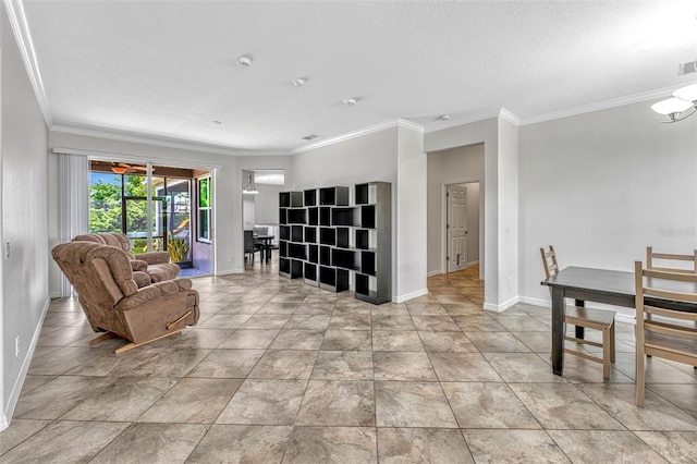 2681 Cabernet Cir, Ocoee, FL 34761 - sitting room with ornamental molding, a textured ceiling, and baseboards