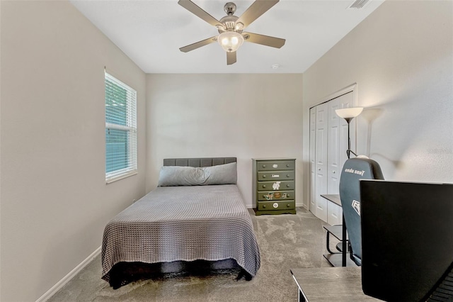 2681 Cabernet Cir, Ocoee, FL 34761 - bedroom with light carpet, a closet, baseboards, and ceiling fan