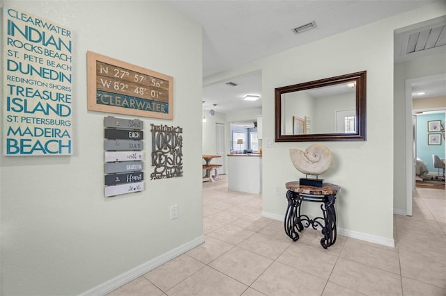 135 Florida Blvd, Crystal Beach, FL 34681 - hall featuring tile patterned flooring and baseboards