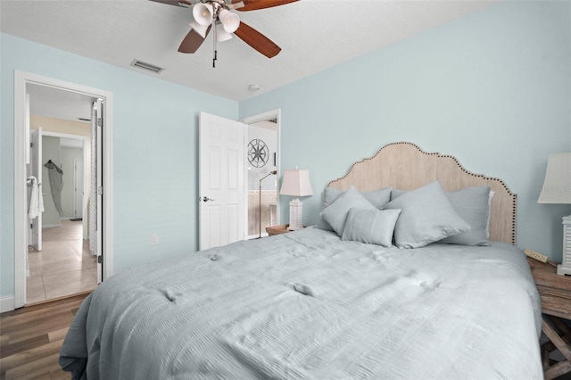 135 Florida Blvd, Crystal Beach, FL 34681 - bedroom featuring wood finished floors, ceiling fan, and baseboards