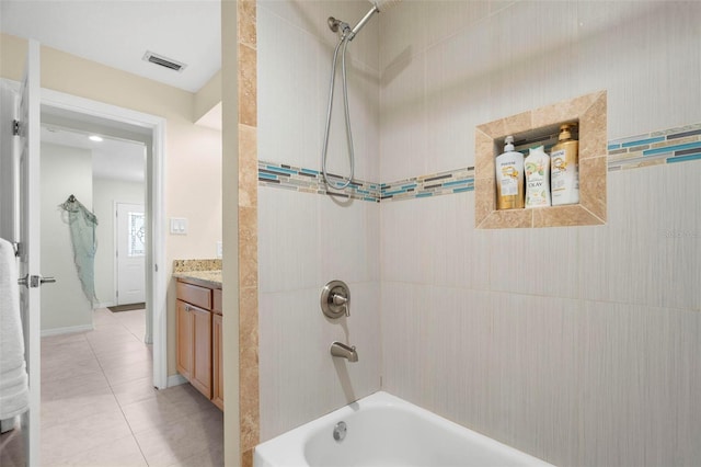 135 Florida Blvd, Crystal Beach, FL 34681 - full bathroom with washtub / shower combination, vanity, and tile patterned flooring