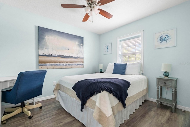 135 Florida Blvd, Crystal Beach, FL 34681 - bedroom featuring wood finished floors, baseboards, ceiling fan, and a desk