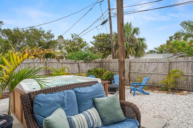 135 Florida Blvd, Crystal Beach, FL 34681 - fenced backyard with a hot tub