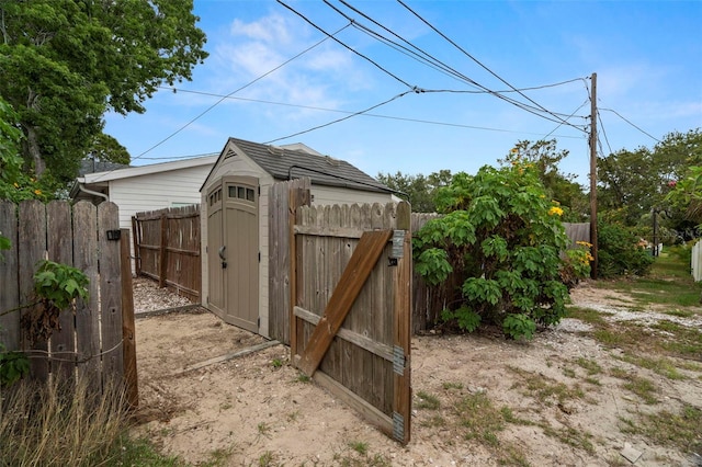 135 Florida Blvd, Crystal Beach, FL 34681 - view of shed featuring a gate