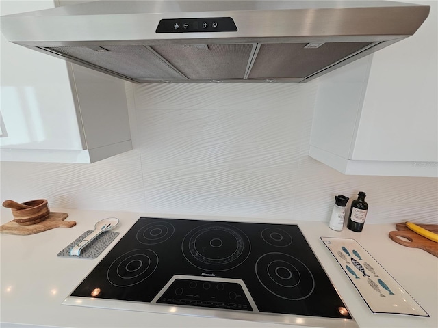 2408 Nassau St, Sarasota, FL 34231 - kitchen view of extractor fan, stove, and light countertops