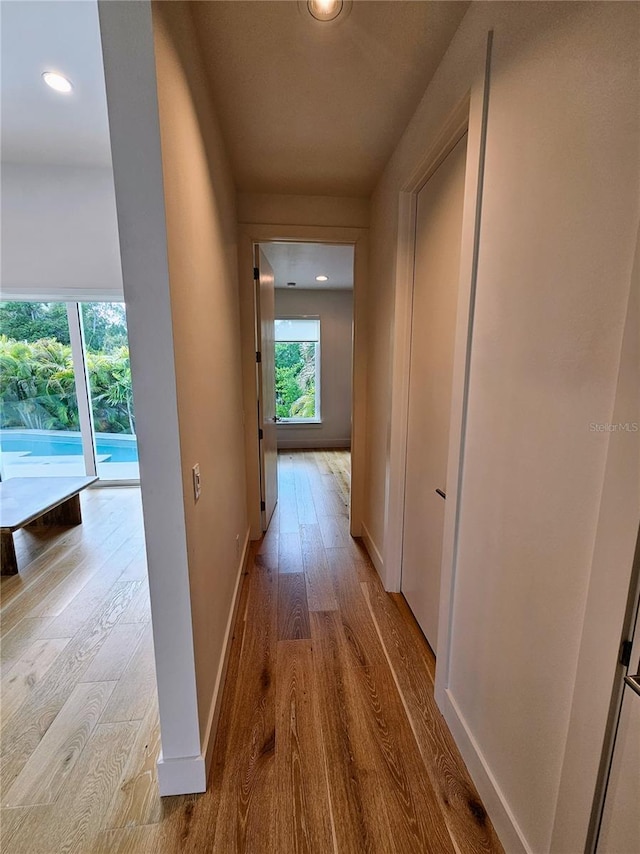 2408 Nassau St, Sarasota, FL 34231 - corridor featuring wood finished floors, recessed lighting, and baseboards