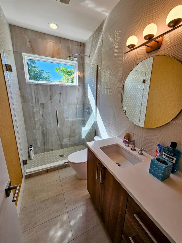 2408 Nassau St, Sarasota, FL 34231 - bathroom featuring vanity, a stall shower, toilet, and tile patterned floors