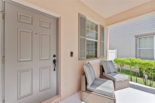 3426 Schoolhouse Rd, Harmony, FL 34773 - property entrance with stucco siding