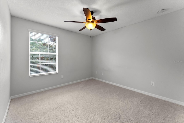 3426 Schoolhouse Rd, Harmony, FL 34773 - carpeted spare room with a smoke detector and a ceiling fan