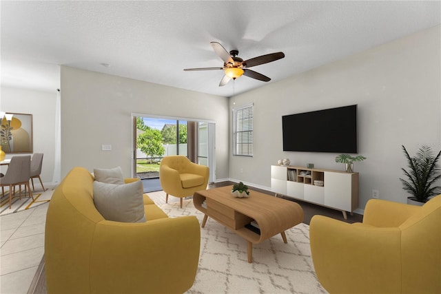 3426 Schoolhouse Rd, Harmony, FL 34773 - living room featuring a ceiling fan and light tile patterned floors