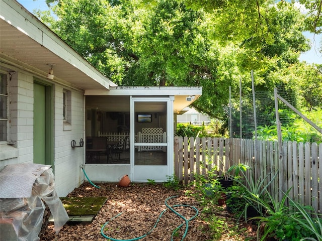 12130 Lakeshore Dr, Clermont, FL 34711 - view of yard featuring a sunroom