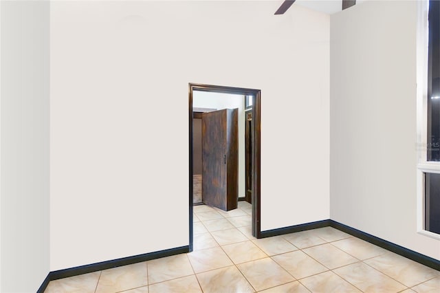 9774 Bohart Ct, Orlando, FL 32836 - unfurnished room featuring a ceiling fan and light tile patterned floors