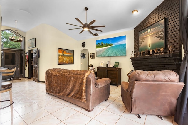 9774 Bohart Ct, Orlando, FL 32836 - living room featuring lofted ceiling, a ceiling fan, light tile patterned floors, and arched walkways