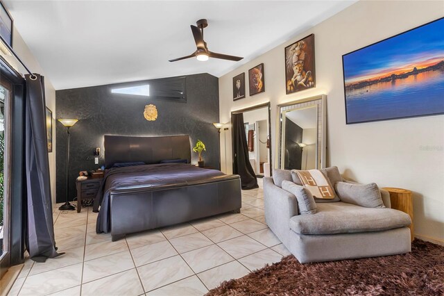 9774 Bohart Ct, Orlando, FL 32836 - bedroom featuring an accent wall, light tile patterned flooring, and a ceiling fan