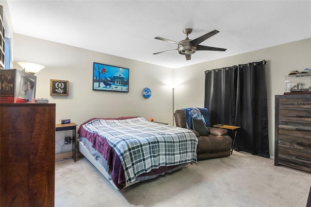9774 Bohart Ct, Orlando, FL 32836 - bedroom featuring light carpet, a ceiling fan, and a textured ceiling