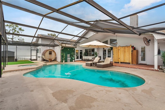 9774 Bohart Ct, Orlando, FL 32836 - outdoor pool with an in-ground hot tub, a patio, and glass enclosure