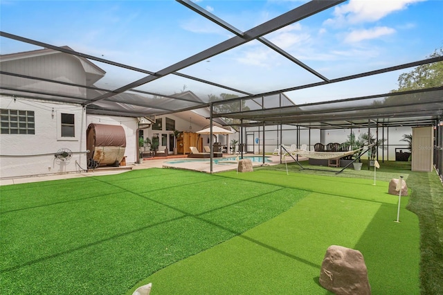9774 Bohart Ct, Orlando, FL 32836 - rear view of house featuring a putting area, an outdoor pool, a patio area, and glass enclosure
