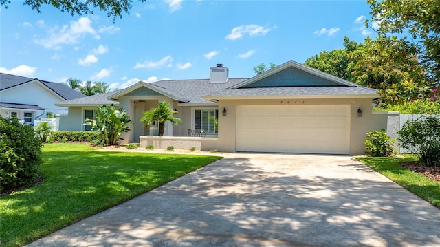 8473 Granada Blvd, Orlando, FL 32836 - single story home featuring a shingled roof, a chimney, a front lawn, an attached garage, and stucco siding