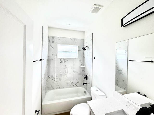 319 Anchovie Ct, Poinciana, FL 34759 - full bath with toilet, vanity, and shower / washtub combination