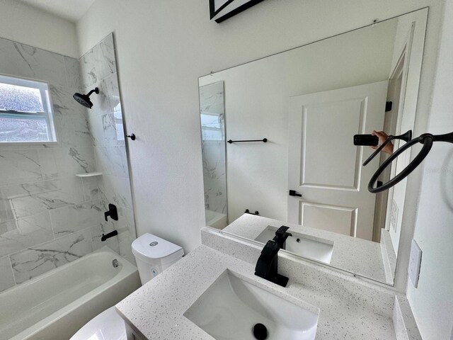 319 Anchovie Ct, Poinciana, FL 34759 - full bath with toilet,  shower combination, and vanity