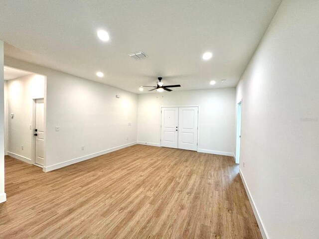 319 Anchovie Ct, Poinciana, FL 34759 - unfurnished room with recessed lighting, light wood-style floors, ceiling fan, and baseboards