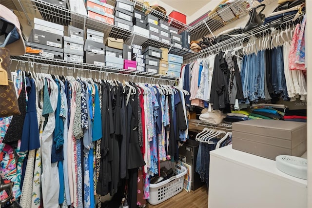 9426 Burnam Dr, Weeki Wachee, FL 34613 - walk in closet featuring wood finished floors