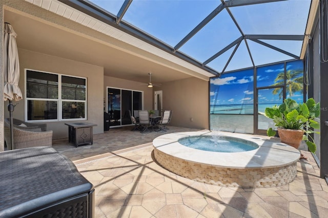 9426 Burnam Dr, Weeki Wachee, FL 34613 - view of swimming pool with a patio area, ceiling fan, a lanai, and outdoor dining space