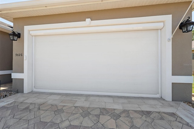 9426 Burnam Dr, Weeki Wachee, FL 34613 - garage featuring driveway