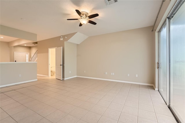 26622 Castleview Way, Wesley Chapel, FL 33544 - empty room featuring ceiling fan, baseboards, and stairs