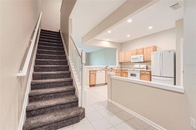 26622 Castleview Way, Wesley Chapel, FL 33544 - stairway with tile patterned floors and recessed lighting