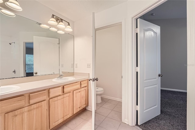 26622 Castleview Way, Wesley Chapel, FL 33544 - full bathroom with double vanity, toilet, and tile patterned flooring