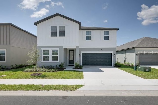 2363 Lancashire St, Davenport, FL 33896 - view of front of property featuring concrete driveway, a front yard, a garage, board and batten siding, and stucco siding