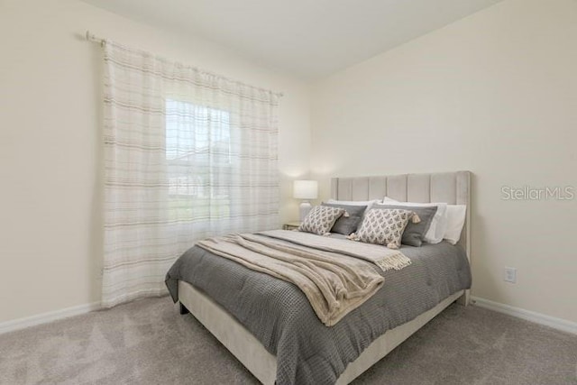 2363 Lancashire St, Davenport, FL 33896 - bedroom featuring carpet flooring and baseboards