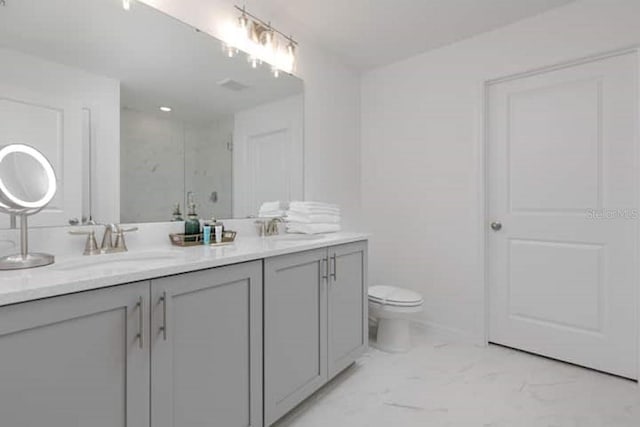 2363 Lancashire St, Davenport, FL 33896 - full bath with double vanity, toilet, a shower with shower door, and marble look tiles