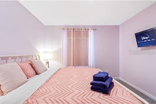 2363 Lancashire St, Davenport, FL 33896 - bedroom with baseboards