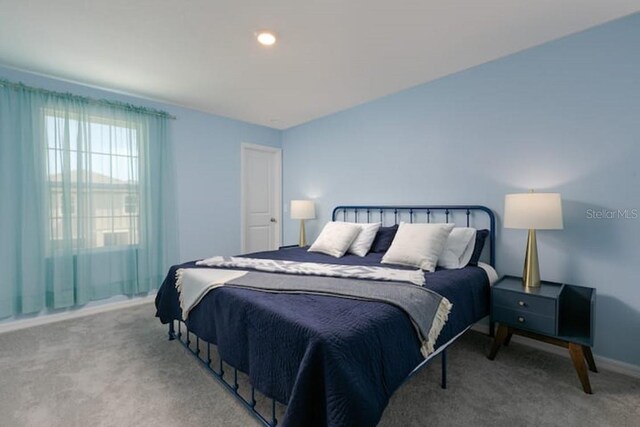 2363 Lancashire St, Davenport, FL 33896 - bedroom with carpet and baseboards