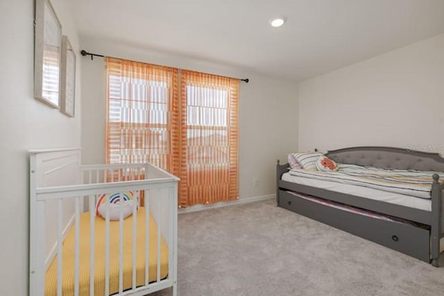 2363 Lancashire St, Davenport, FL 33896 - bedroom featuring carpet flooring, a nursery area, recessed lighting, and baseboards