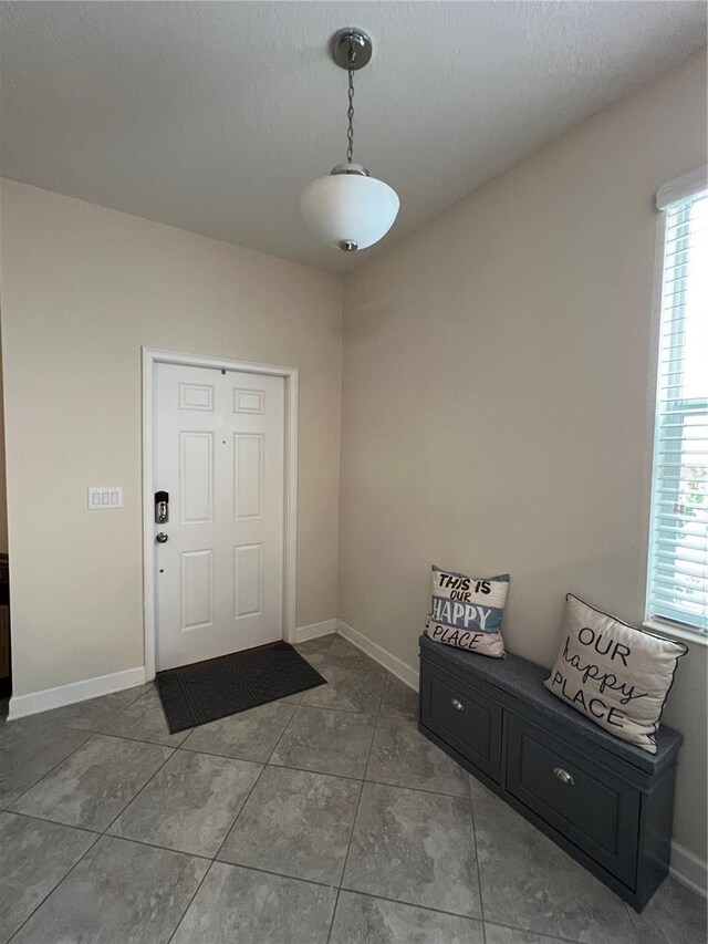 11097 N Folklore St, Winter Garden, FL 34787 - tiled entrance foyer with baseboards