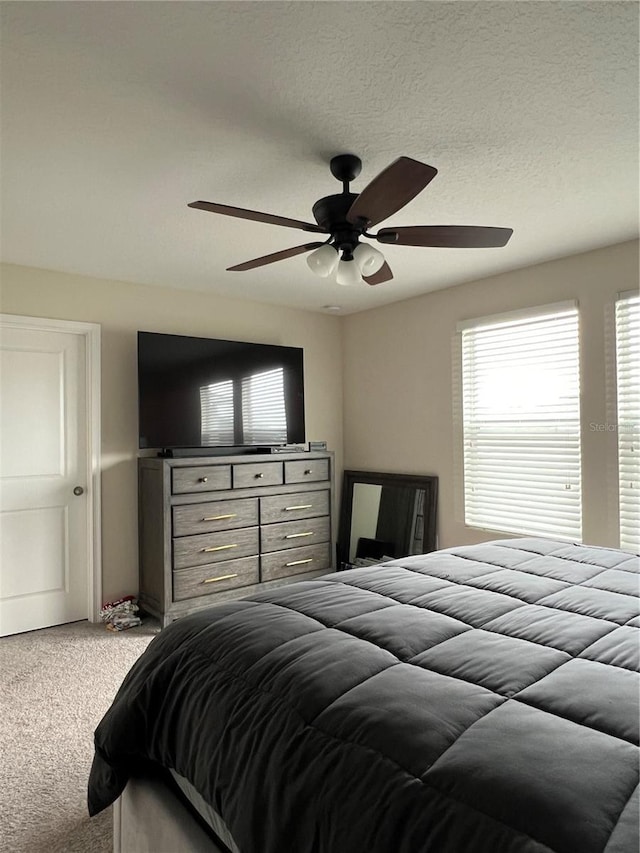 11097 N Folklore St, Winter Garden, FL 34787 - bedroom featuring light colored carpet and a ceiling fan