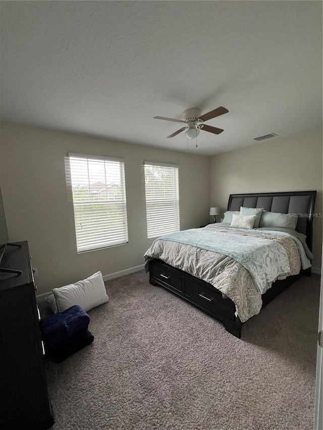 11097 N Folklore St, Winter Garden, FL 34787 - carpeted bedroom with ceiling fan and baseboards