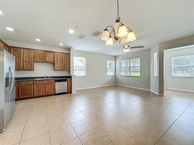 2005 Compass Flower Way, Ocoee, FL 34761 - kitchen with stainless steel appliances, a sink, dark countertops, a chandelier, and recessed lighting