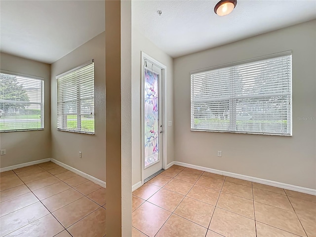 2005 Compass Flower Way, Ocoee, FL 34761 - foyer entrance with light tile patterned flooring and baseboards