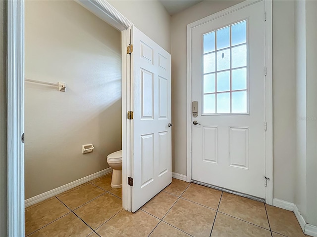2005 Compass Flower Way, Ocoee, FL 34761 - doorway featuring baseboards and light tile patterned floors