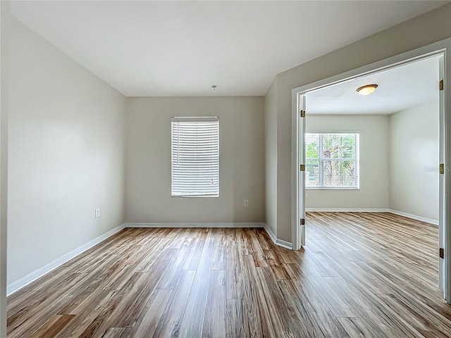 2005 Compass Flower Way, Ocoee, FL 34761 - empty room featuring wood finished floors and baseboards