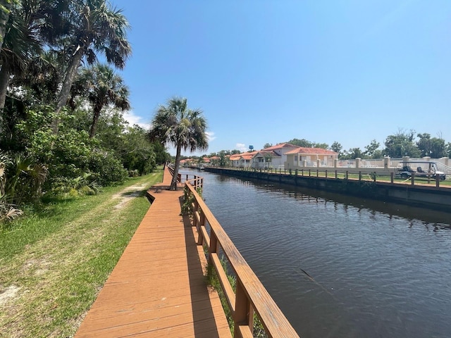 4865 S Tromp Loop, Homosassa, FL 34448 - dock area with a water view and a yard