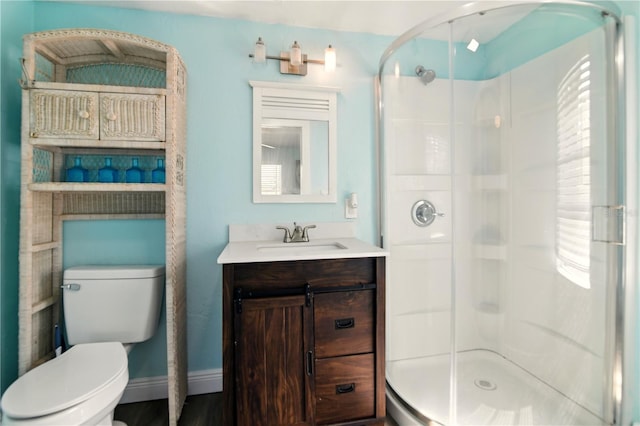 318 Palm St, New Smyrna Beach, FL 32168 - full bath featuring toilet, a stall shower, and vanity